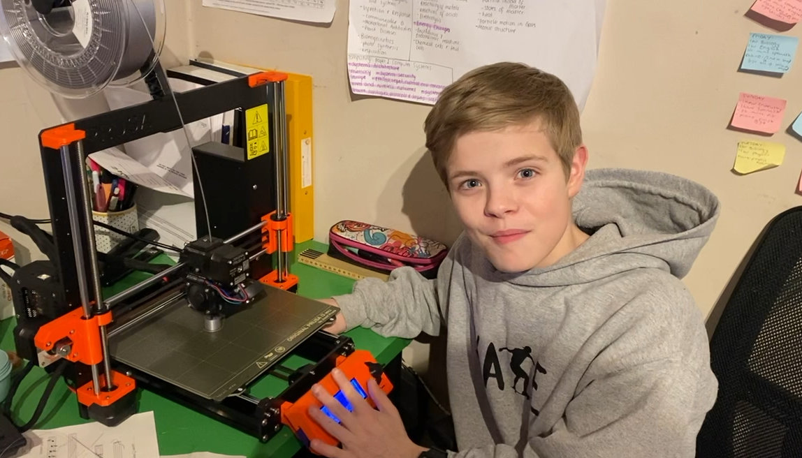 boy builds prusa printer