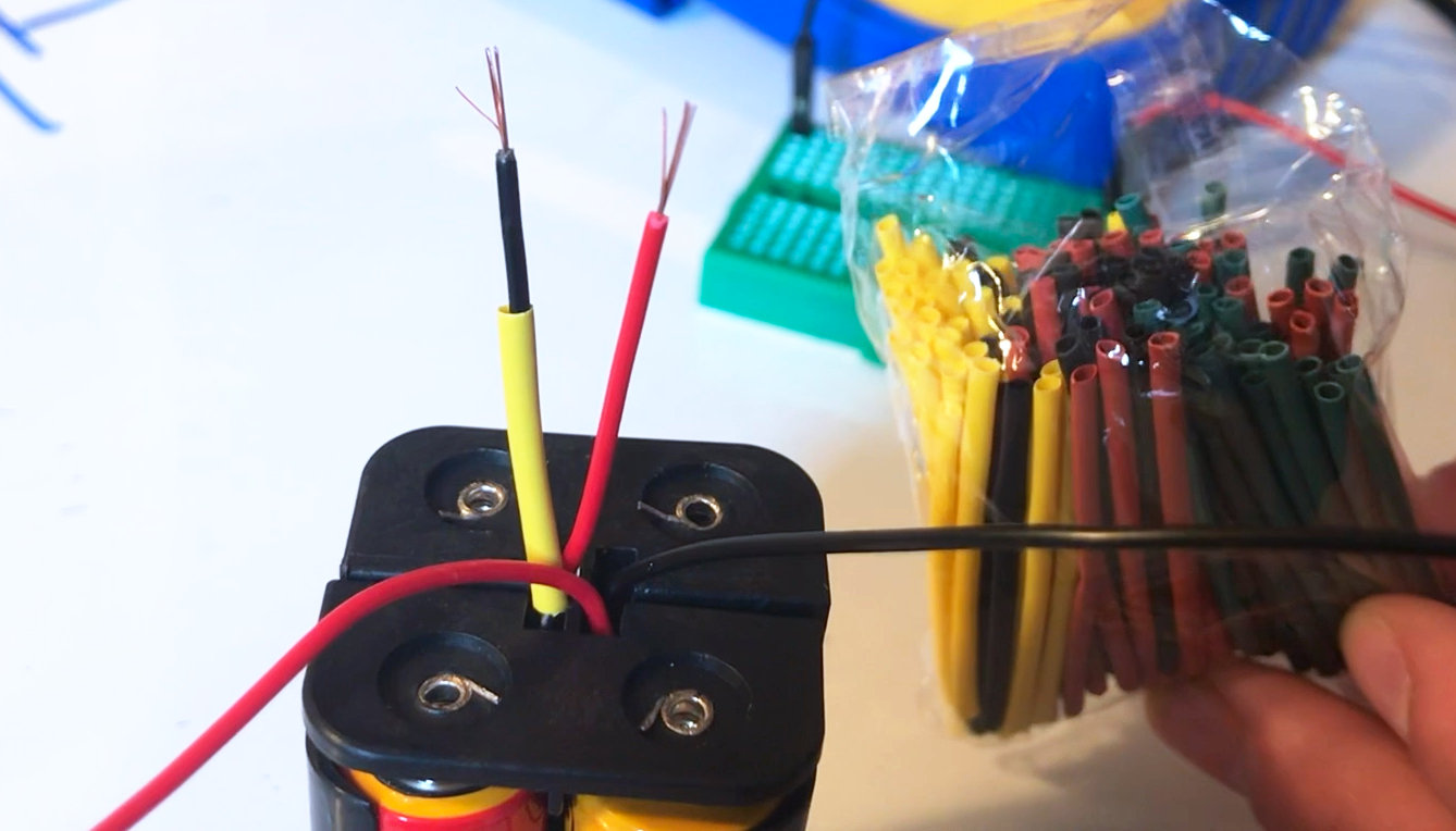 battery pack with stripped wires ready to join